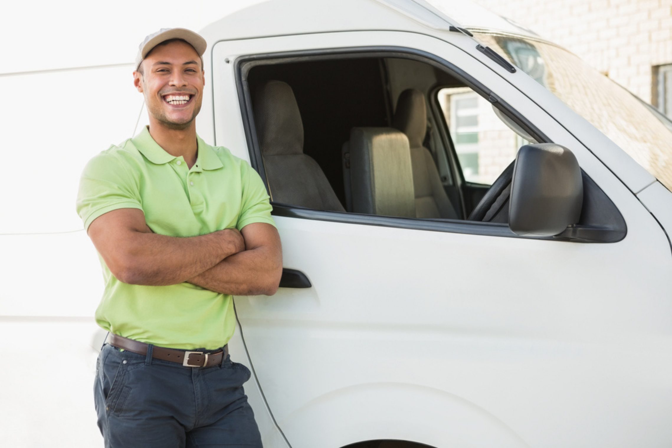 man stood by a white van